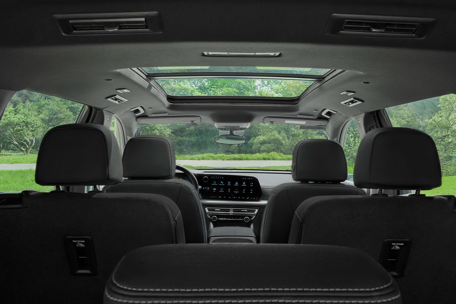 Amplio interior con asientos para pasajeros Chevrolet Traverse.