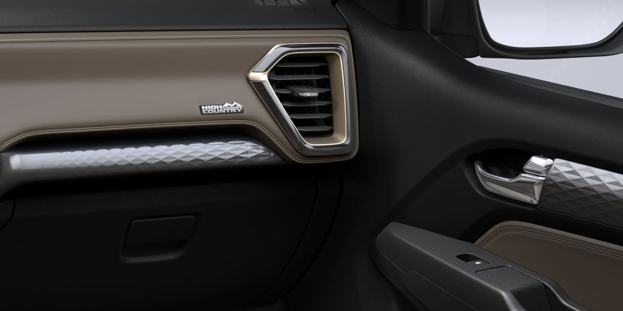 Detalle interior de la puerta derecha de la Chevrolet Colorado con salida de aire y controles eléctricos